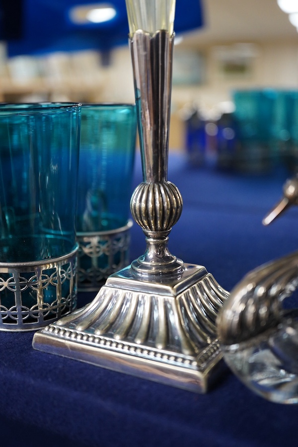 Four coloured glasses with silver stands a similar glass swan salt, a three piece cruet with white metal mounts and a plated single stem epergne, glasses and stands 9cm high., Condition - good